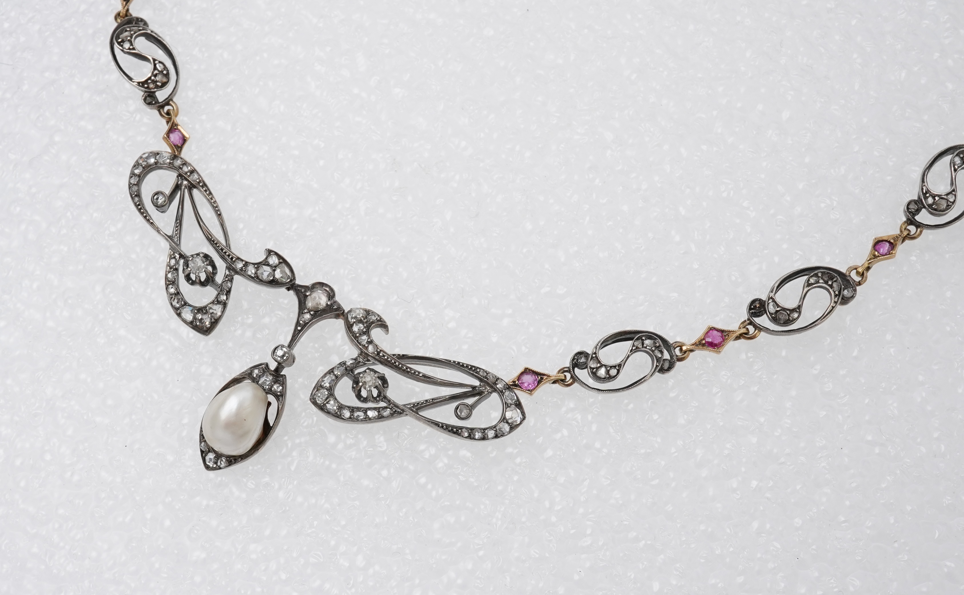 An Art Nouveau ruby, pearl and diamond necklace, France, early 20th century